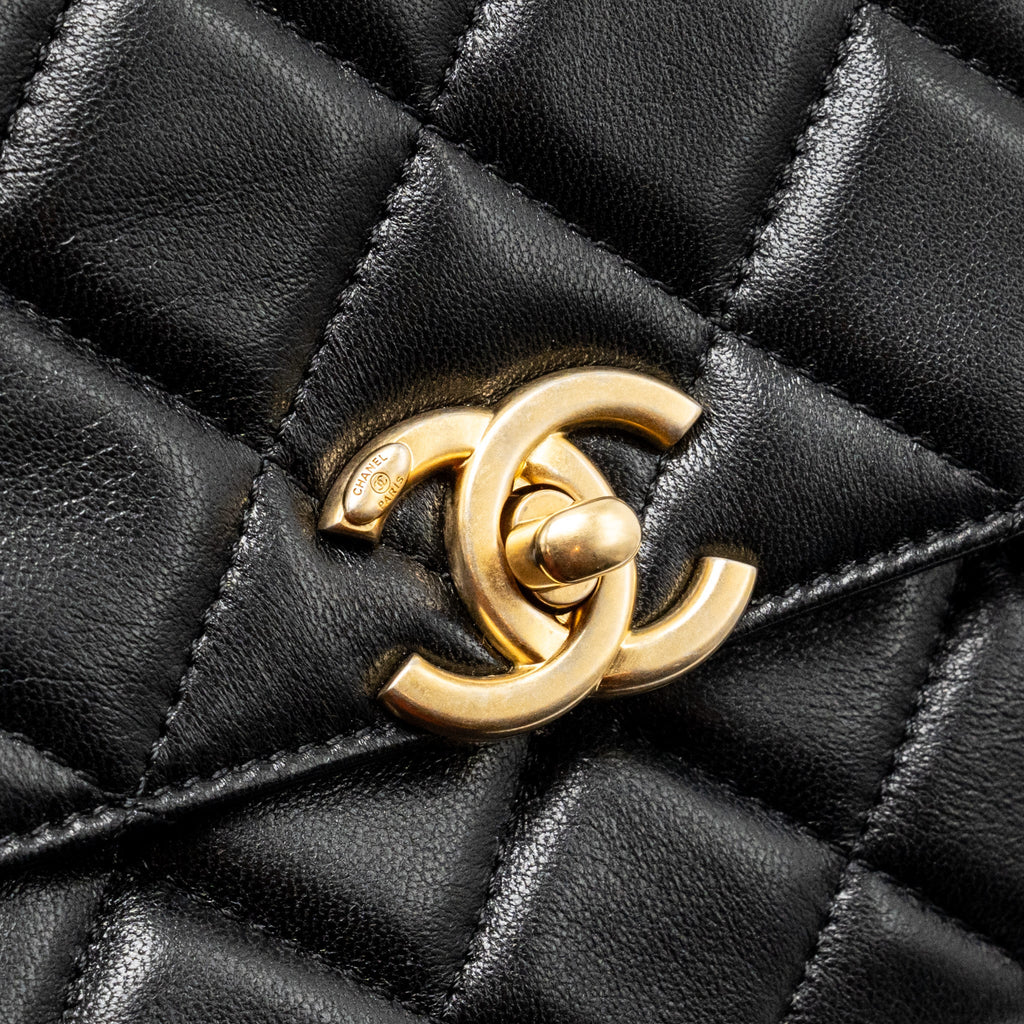 chanel-24s-cc-logo-top-handle-flap-bag-with-chain-lambskin-black-ghw-microchip-copy
