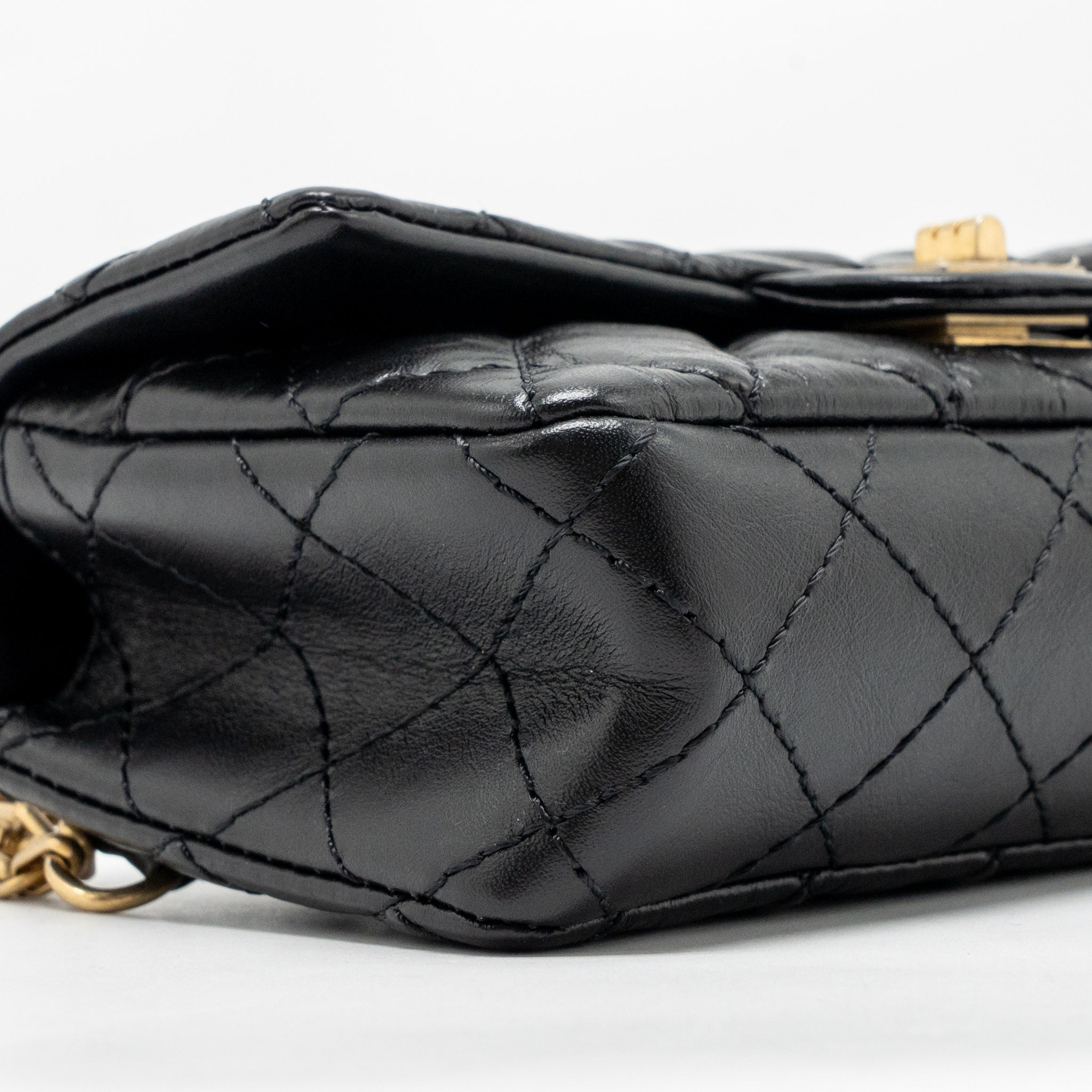 chanel-2-55-reissue-waist-bag-aged-calfskin-black-ghw