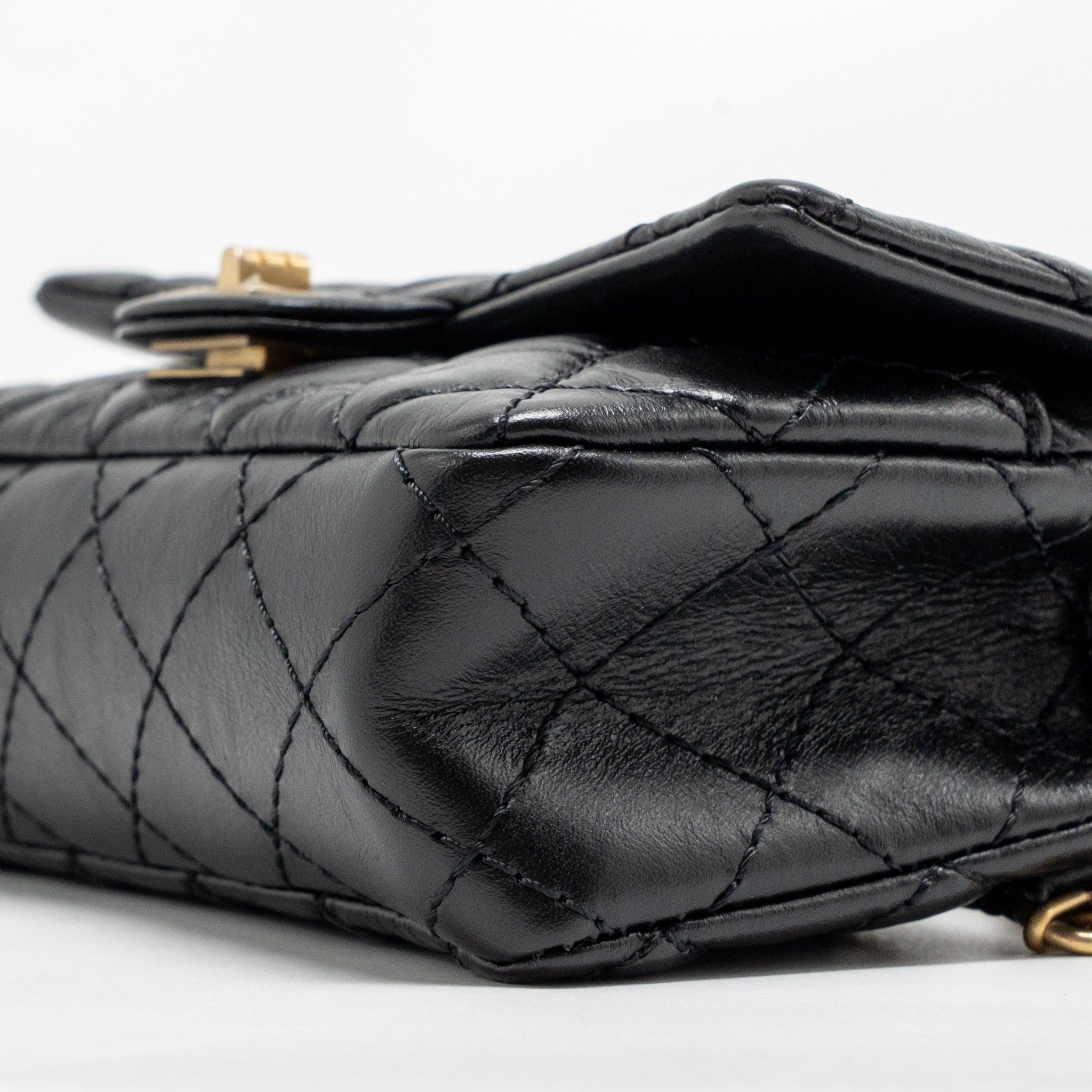 chanel-2-55-reissue-waist-bag-aged-calfskin-black-ghw