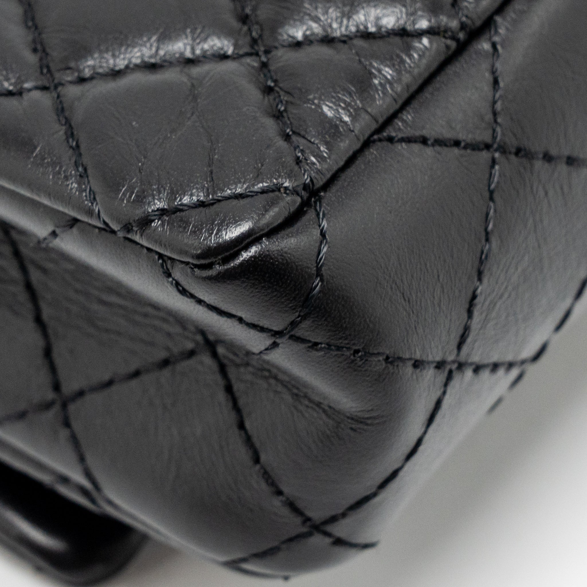 chanel-2-55-reissue-waist-bag-aged-calfskin-black-ghw