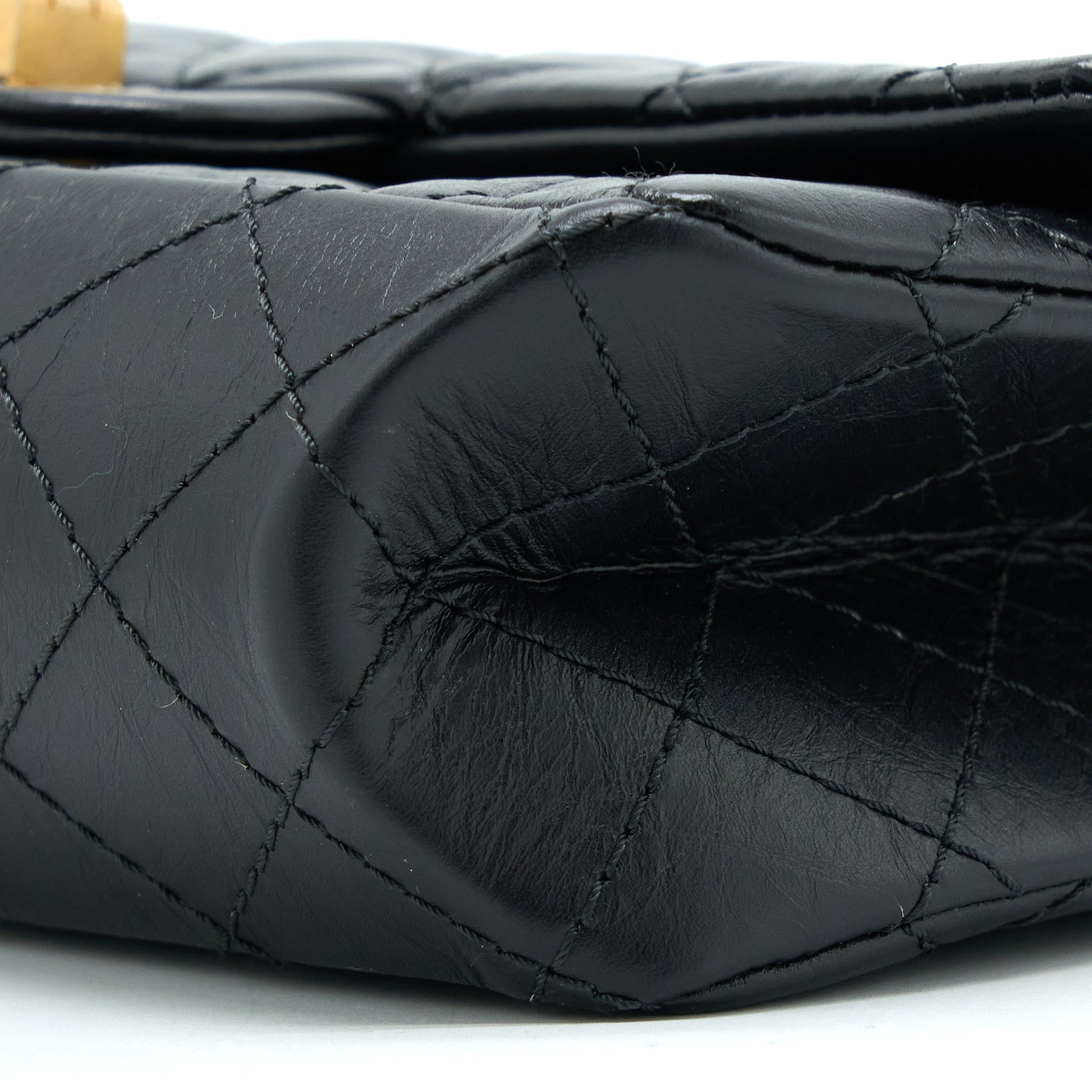 chanel-small-2-55-225-reissue-flap-aged-calfskin-black-brushed-ghw