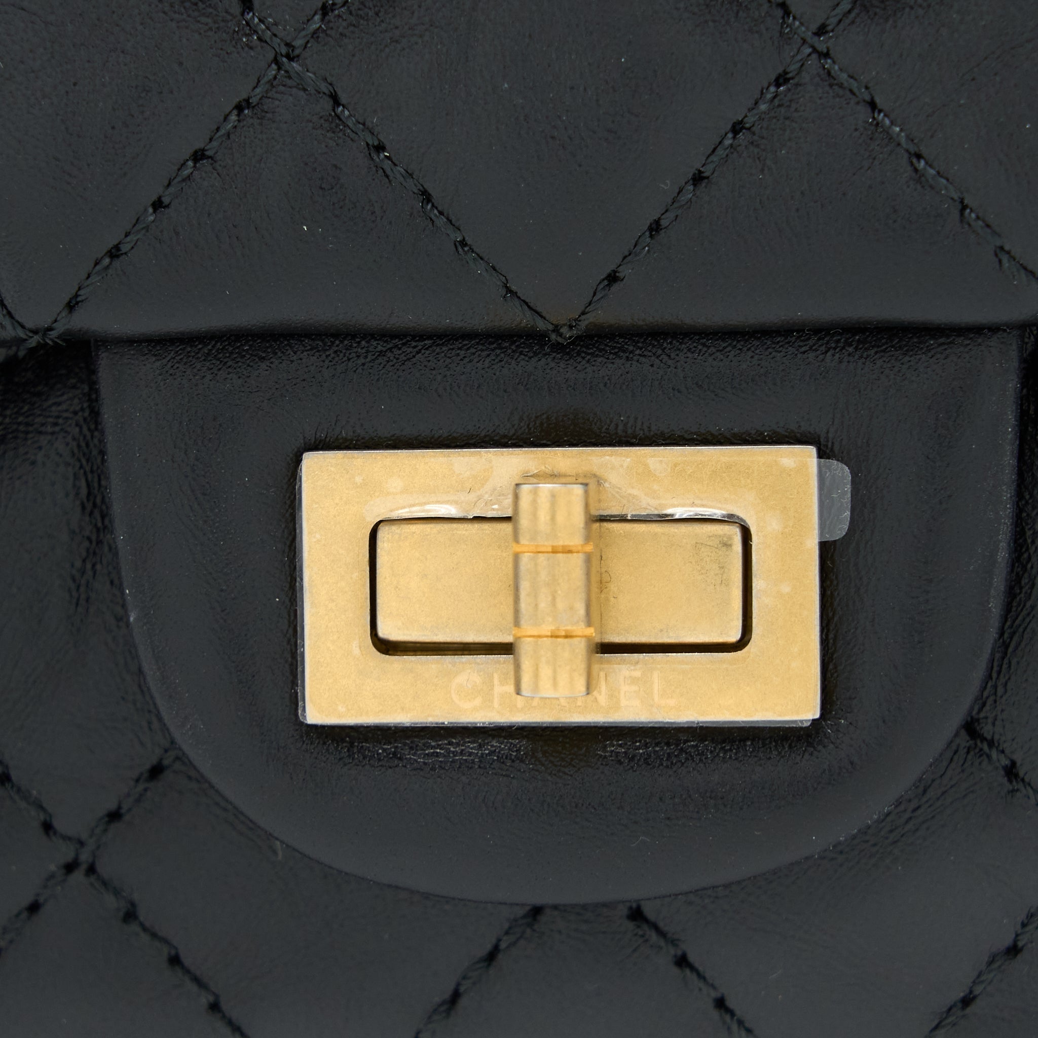 chanel-small-2-55-225-reissue-flap-aged-calfskin-black-brushed-ghw