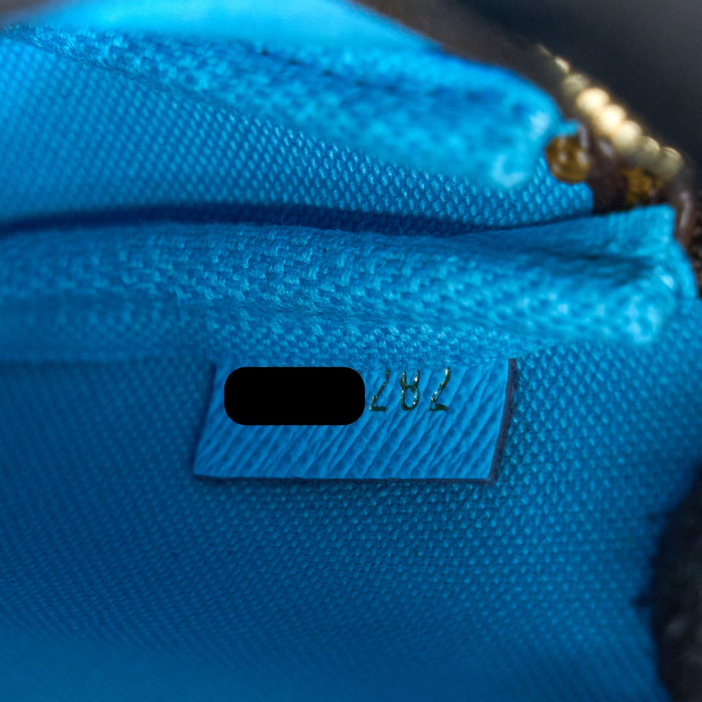 louis-vuitton-vivienne-holidays-mini-pochette-accessories-monogram-canvas-multicolor-ghw
