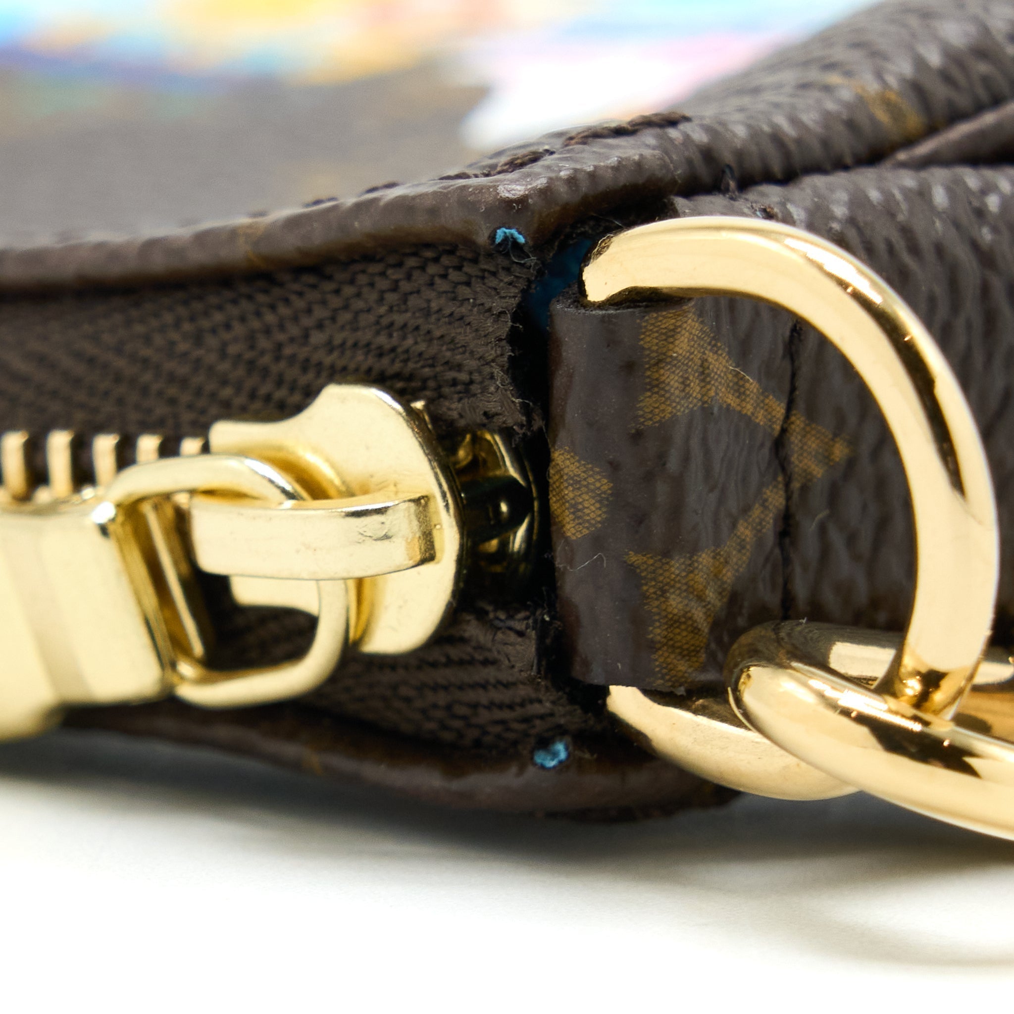 louis-vuitton-vivienne-holidays-mini-pochette-accessories-monogram-canvas-multicolor-ghw