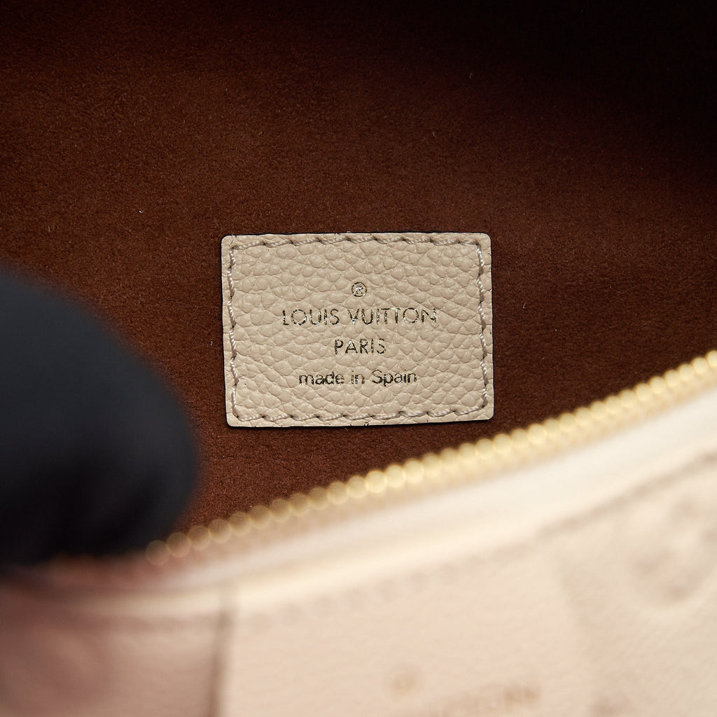 louis-vuitton-monogram-empreinte-bumbag-white