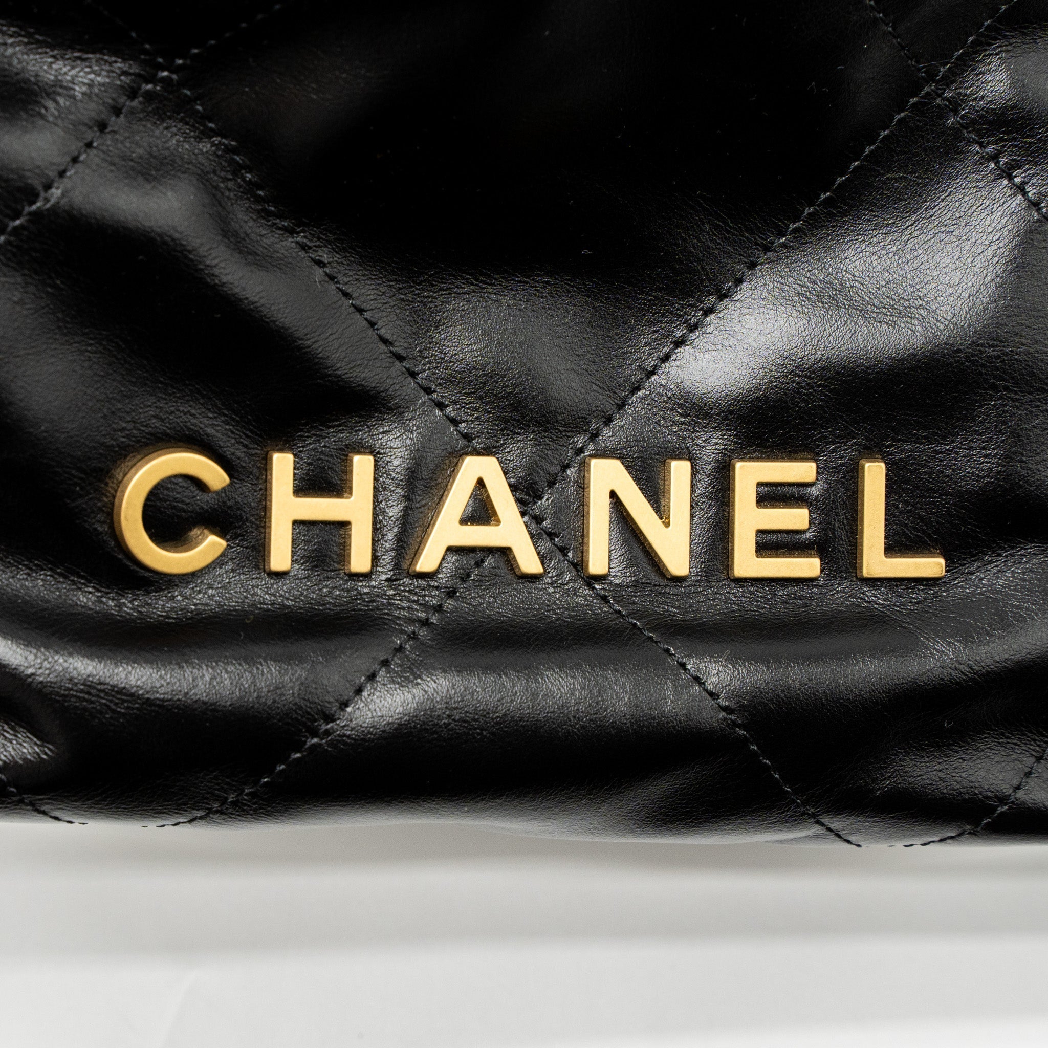 chanel-mini-22-bag-shiny-calfskin-black-brushed-ghw-microchip-1