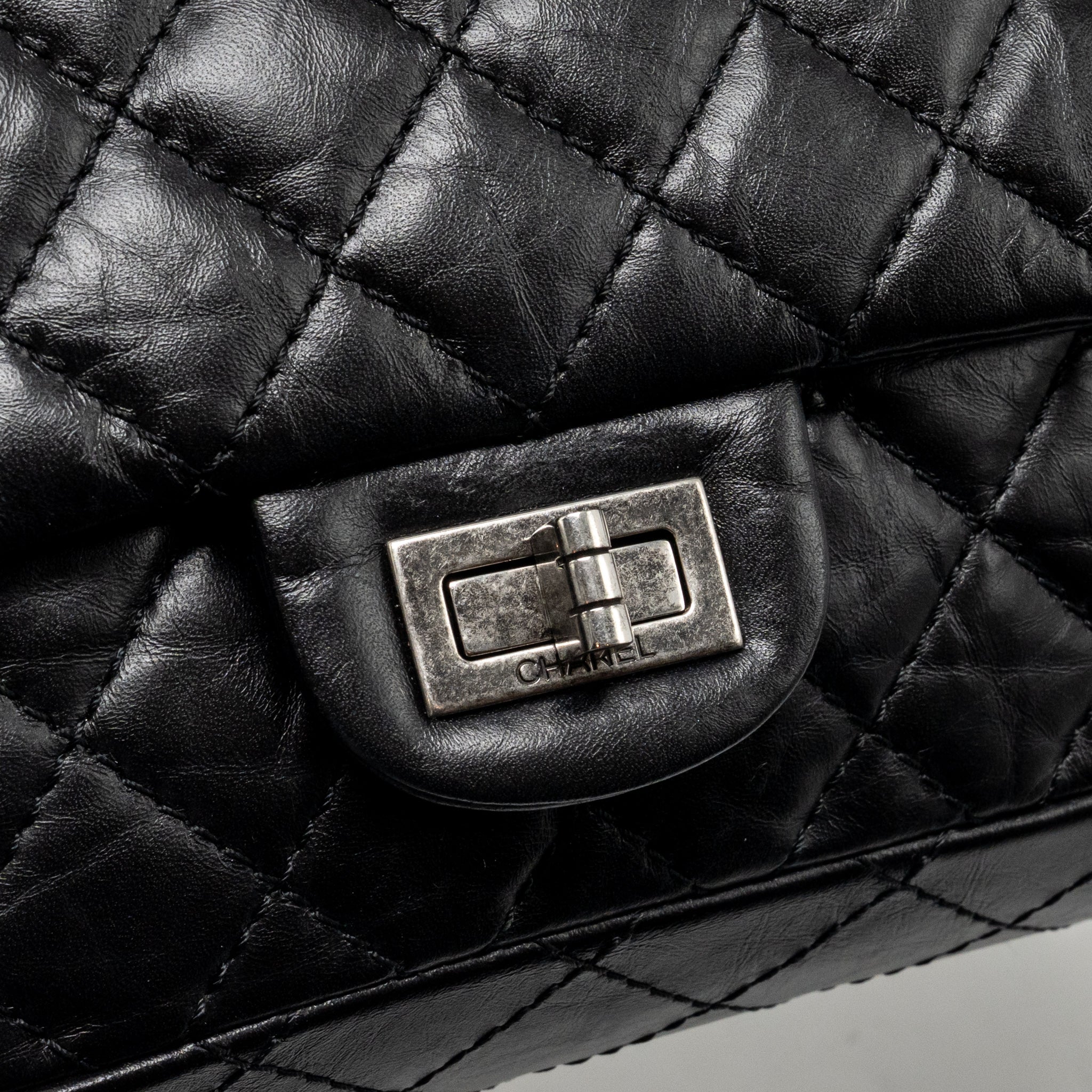 chanel-small-2-55-reissue-flap-bag-aged-calfskin-black-ghw-4