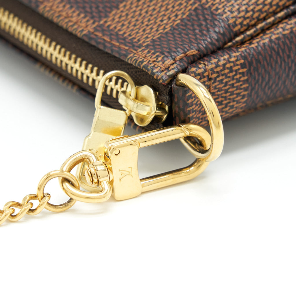 louis-vuitton-mini-pochette-damier-ebene-ghw