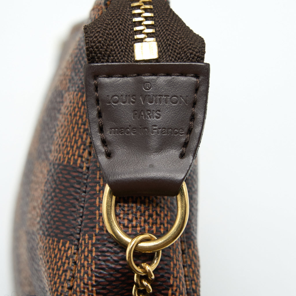 louis-vuitton-mini-pochette-damier-ebene-ghw