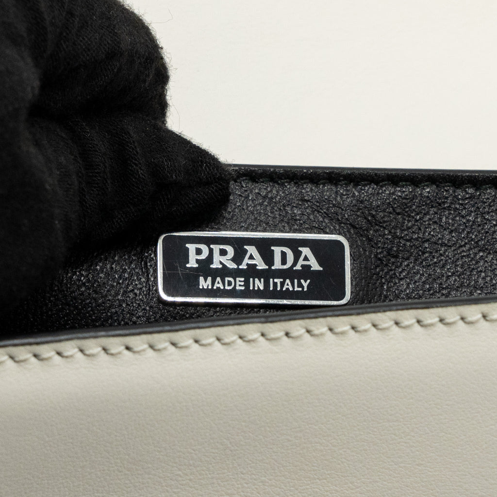prada-cahier-embellished-two-tone-leather-shoulder-bag-white-caramel-shw