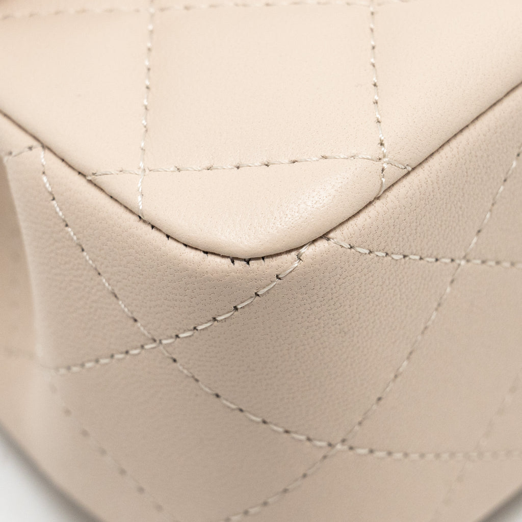 chanel-top-handle-mini-rectangular-flap-bag-lambskin-ecru-dark-beige-lghwmicrochip-copy-1
