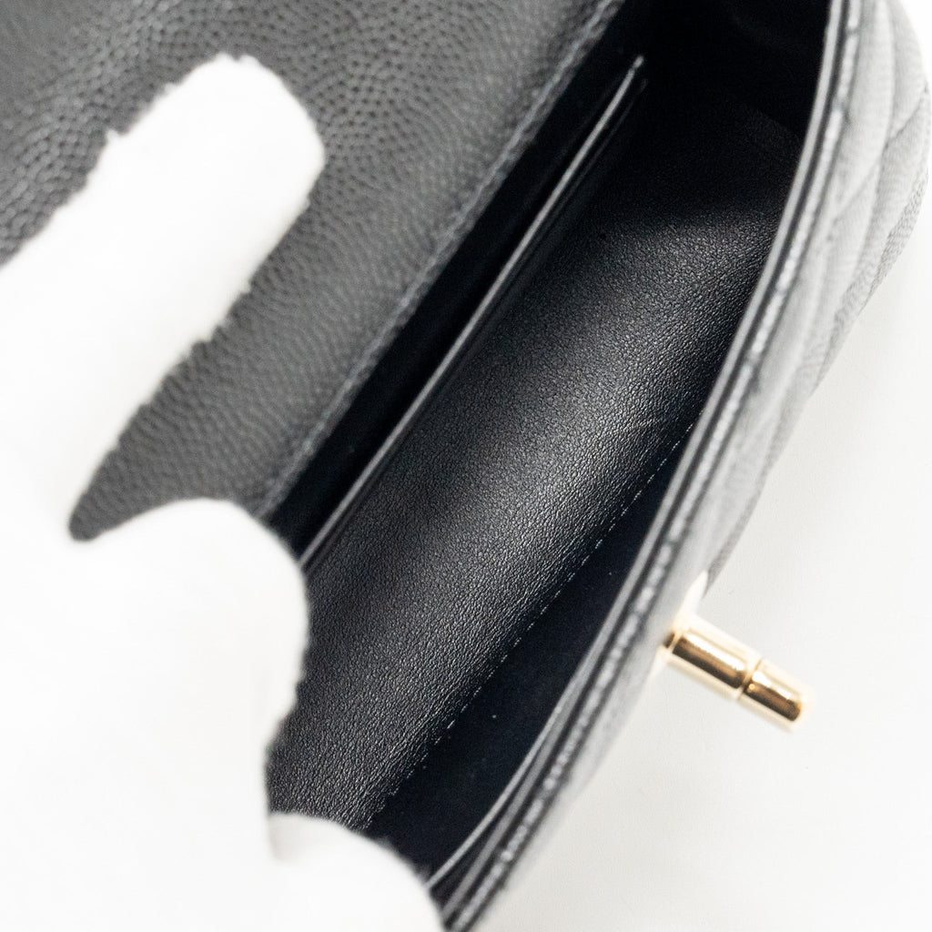 chanel-coco-handle-clutch-with-chain-caviar-black-lghw-microchip