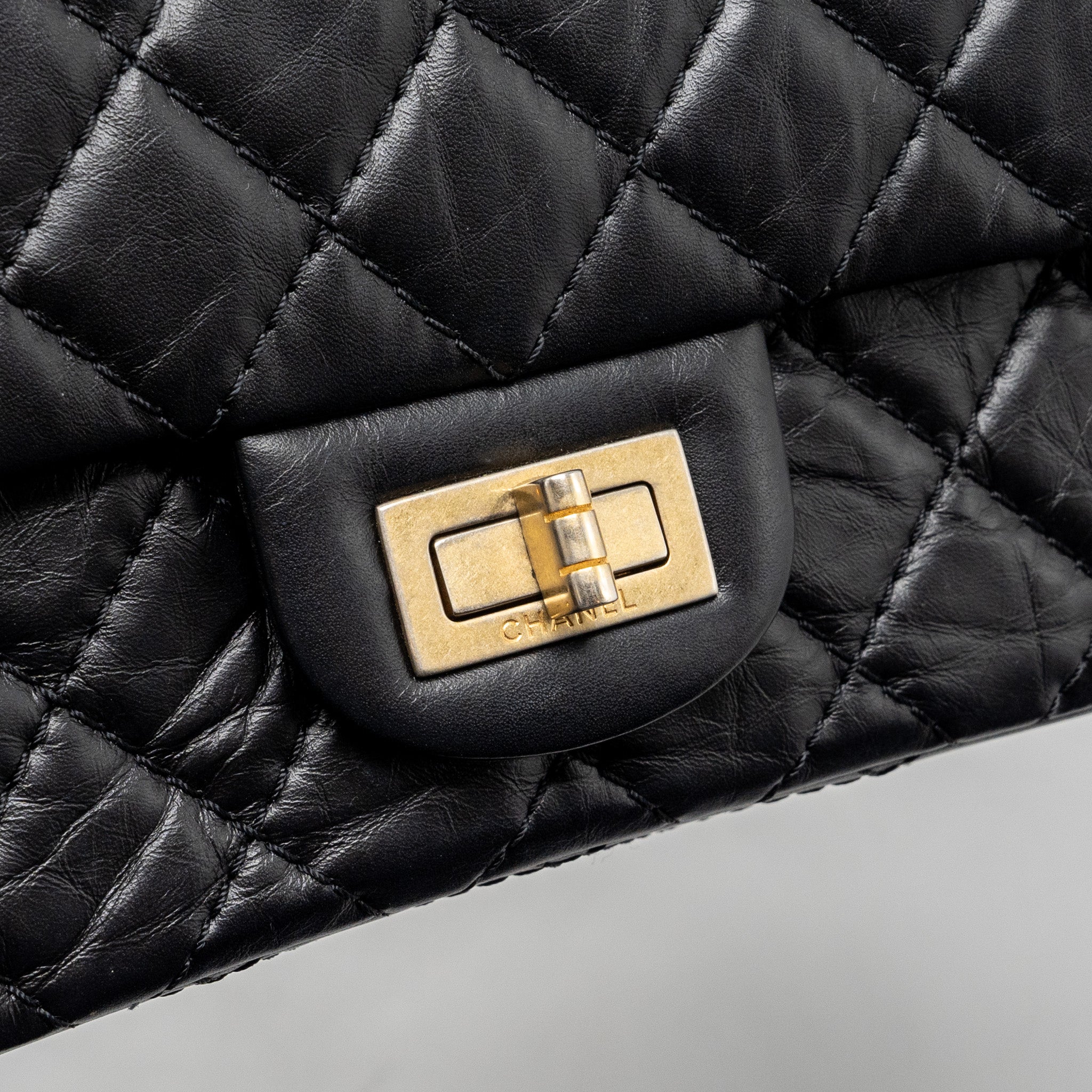 chanel-small-2-55-reissue-double-flap-bag-aged-calfskin-black-ghw-1