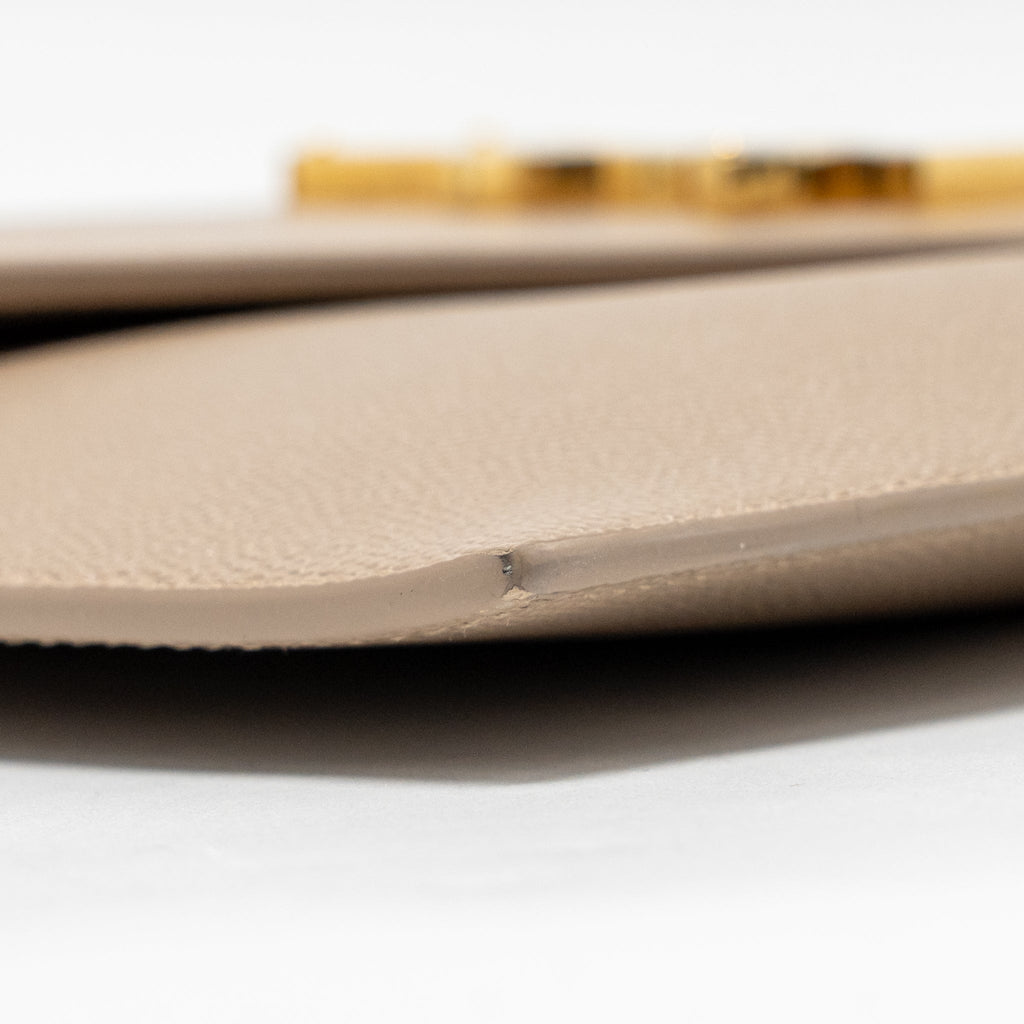 saint-laurent-uptown-clutch-grained-calfskin-beige-ghw