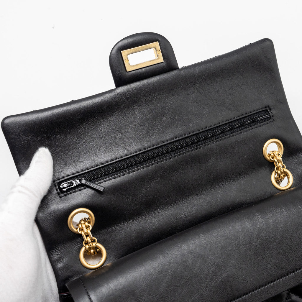 chanel-small-2-55-reissue-double-flap-bag-aged-calfskin-black-ghw-1