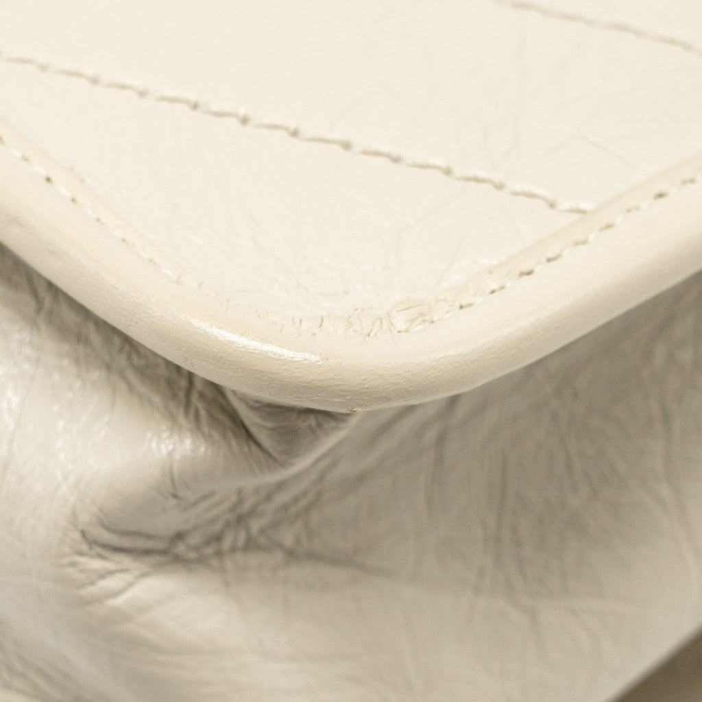 saint-laurent-niki-baby-calfskin-cream-shw