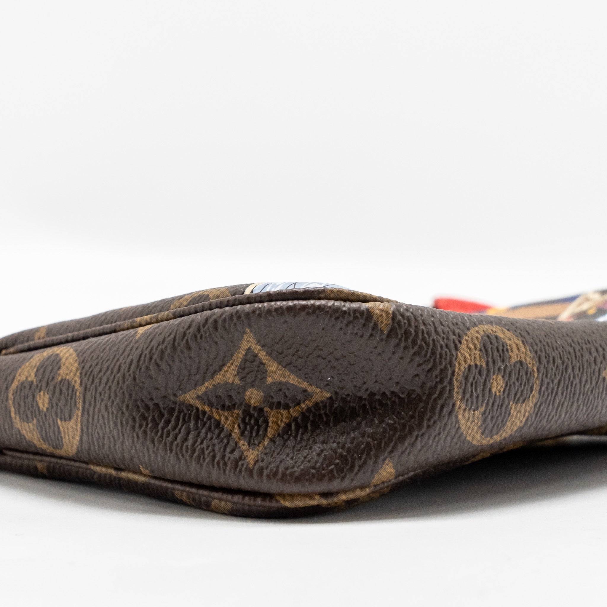 louis-vuitton-mini-pochette-accessories-vivienne-holiday-limited-monogram-canvas-ghw