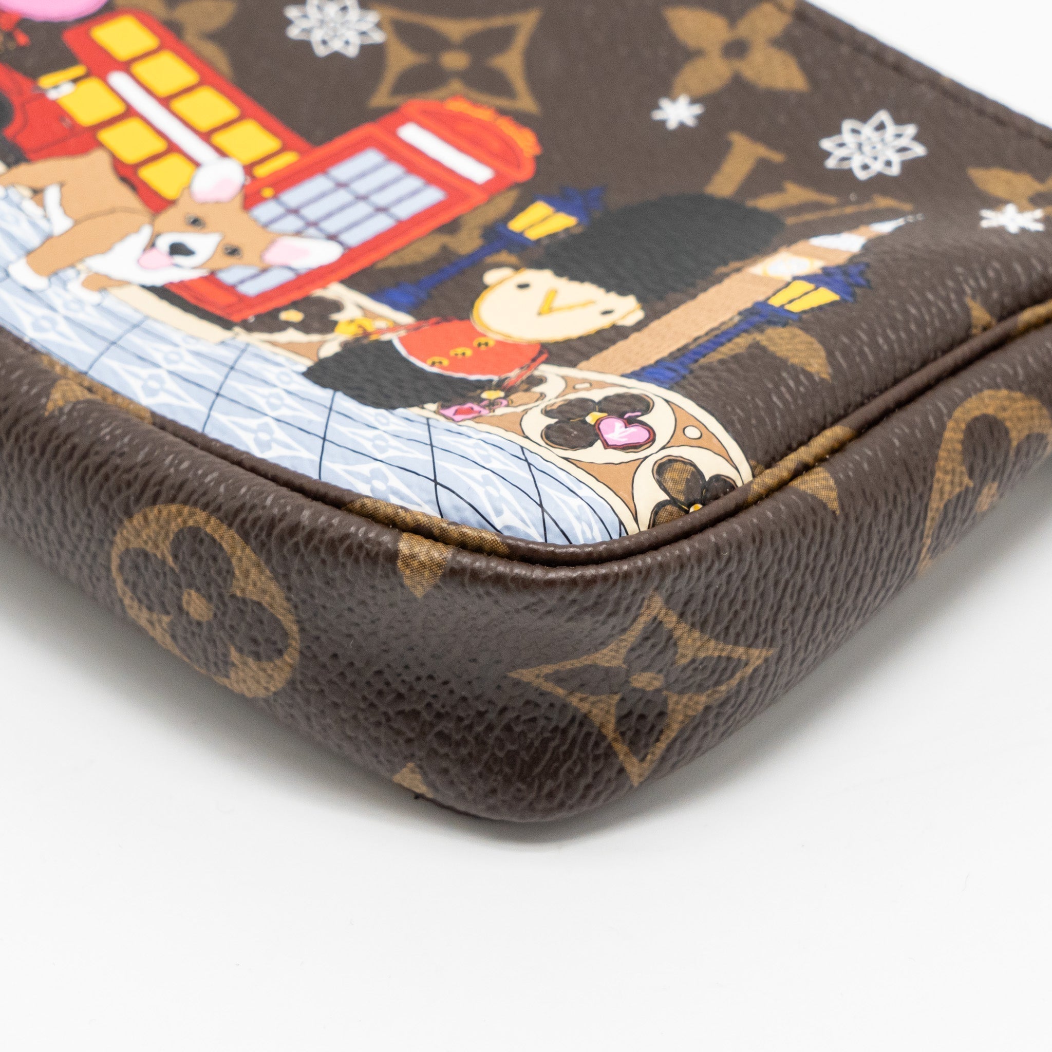 louis-vuitton-mini-pochette-accessories-vivienne-holiday-limited-monogram-canvas-ghw