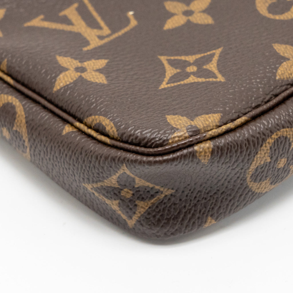 louis-vuitton-mini-pochette-accessories-vivienne-holiday-limited-monogram-canvas-ghw