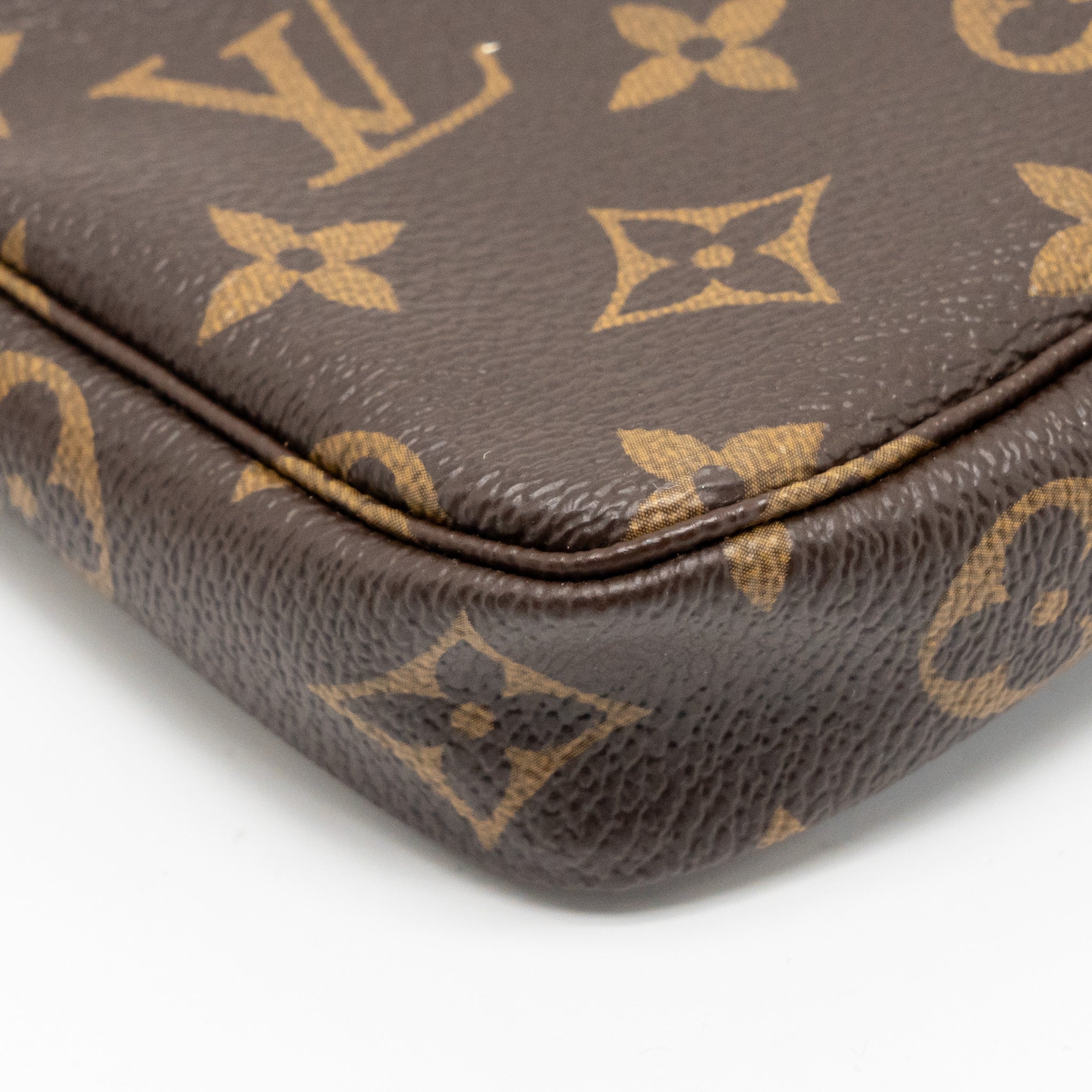 louis-vuitton-mini-pochette-accessories-vivienne-holiday-limited-monogram-canvas-ghw