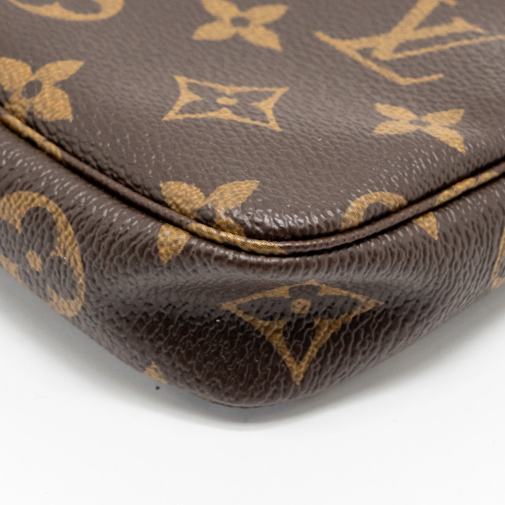 louis-vuitton-mini-pochette-accessories-vivienne-holiday-limited-monogram-canvas-ghw