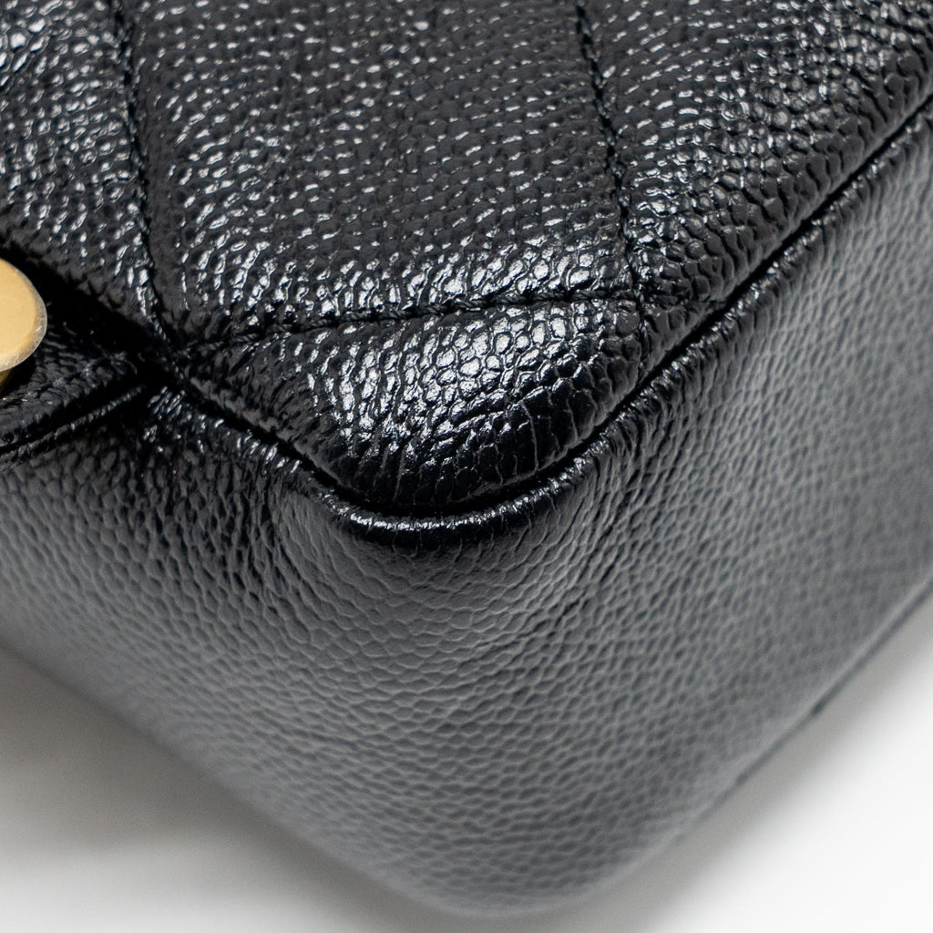 chanel-quilted-flap-backpack-caviar-black-ghw-microchip-1