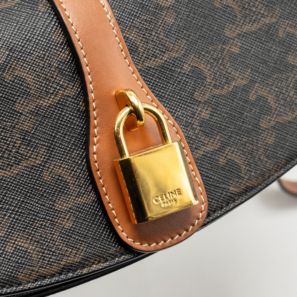 celine-clutch-on-strap-tabou-triomphe-canvas-calfskin-tan-ghw-1