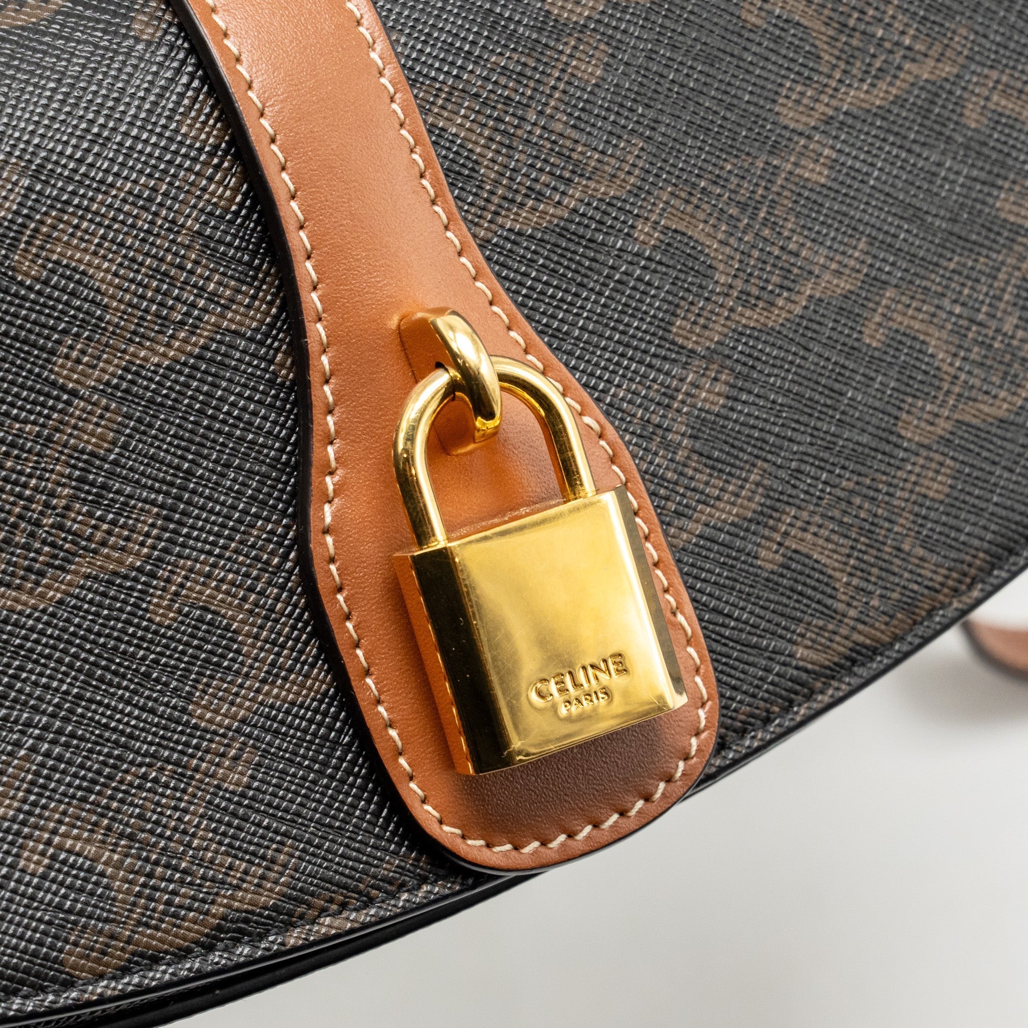 celine-clutch-on-strap-tabou-triomphe-canvas-calfskin-tan-ghw-1