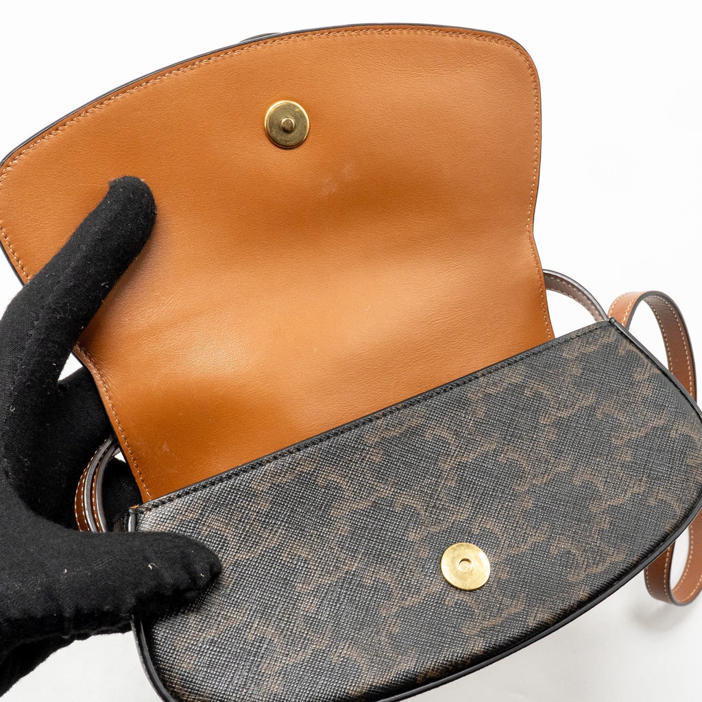 celine-clutch-on-strap-tabou-triomphe-canvas-calfskin-tan-ghw-1