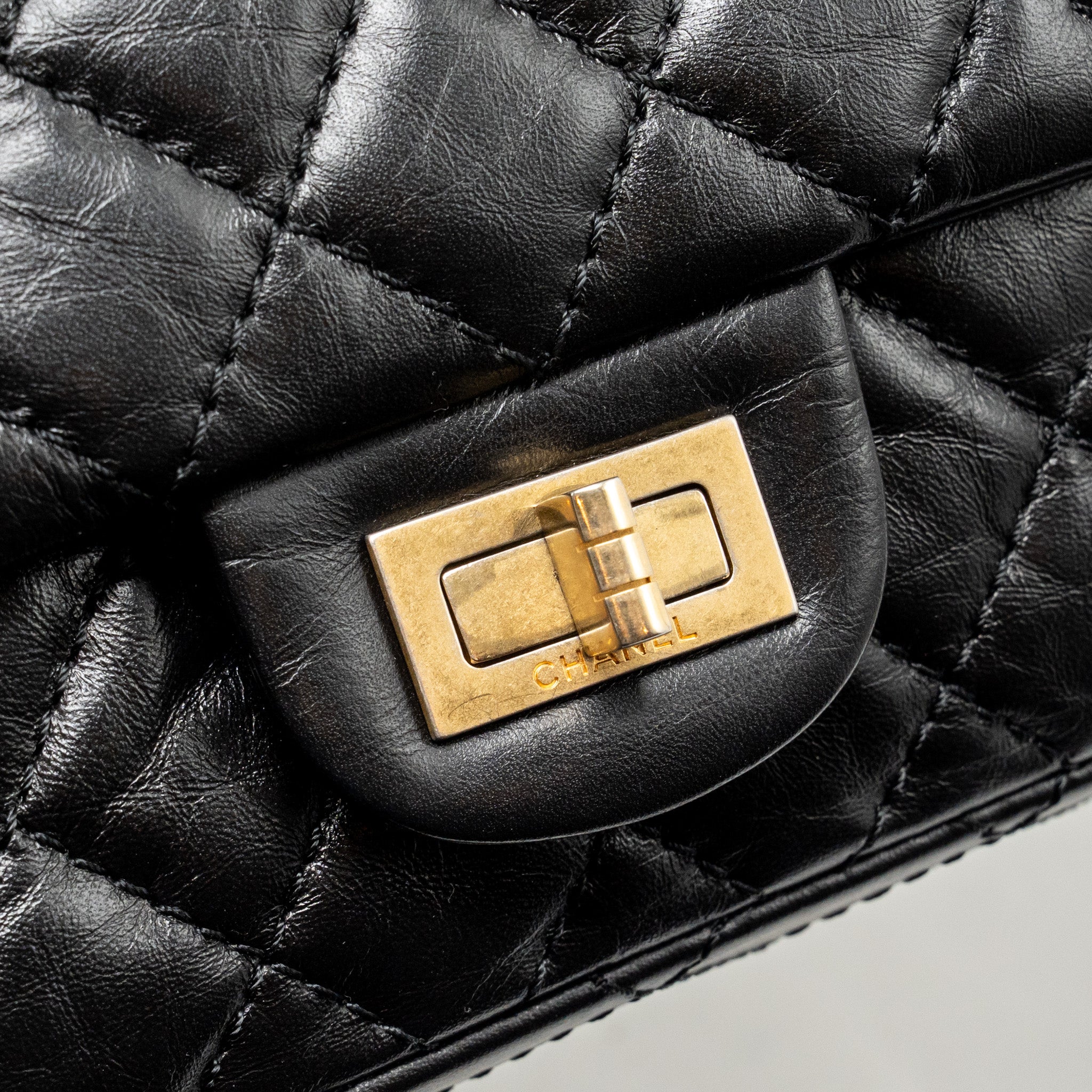 chanel-small-2-55-reissue-flap-bag-aged-calfskin-black-ghw-3