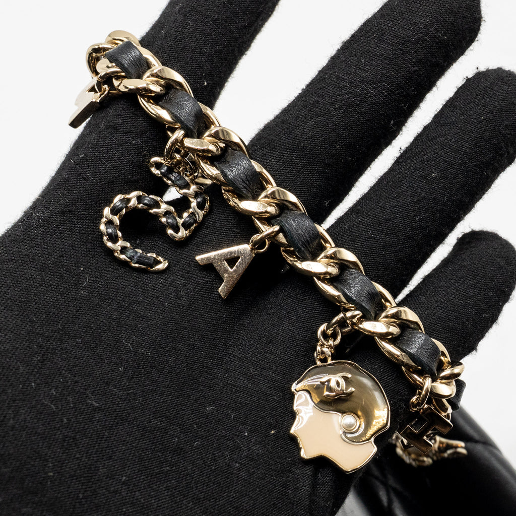chanel-coco-charms-chain-quilted-pouch-bag-lambskin-black-lghw