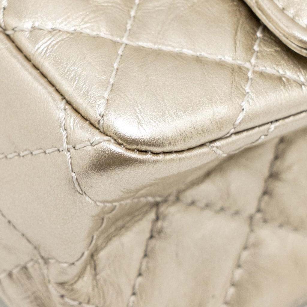 chanel-small-2-55-reissue-double-flap-bag-aged-calfskin-metallic-light-gold-with-lghw