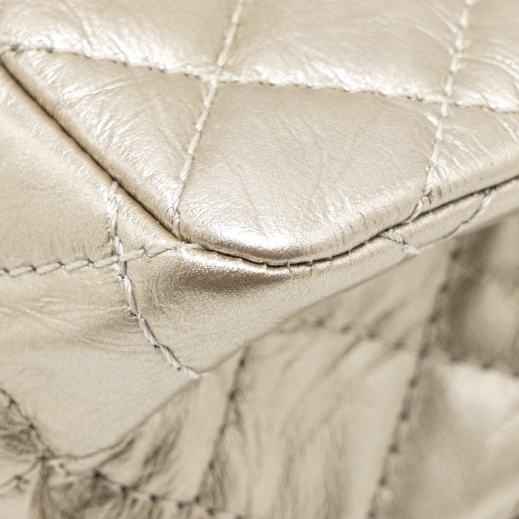 chanel-small-2-55-reissue-double-flap-bag-aged-calfskin-metallic-light-gold-with-lghw