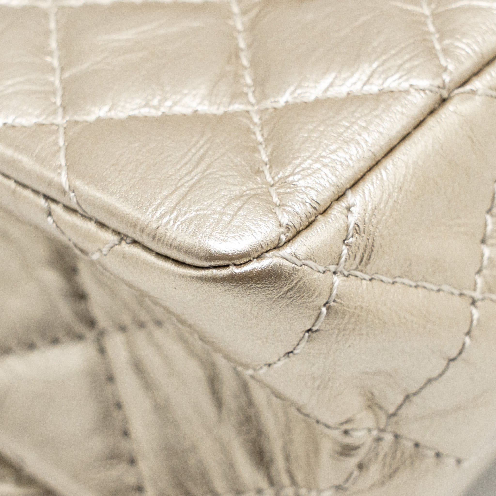 chanel-small-2-55-reissue-double-flap-bag-aged-calfskin-metallic-light-gold-with-lghw
