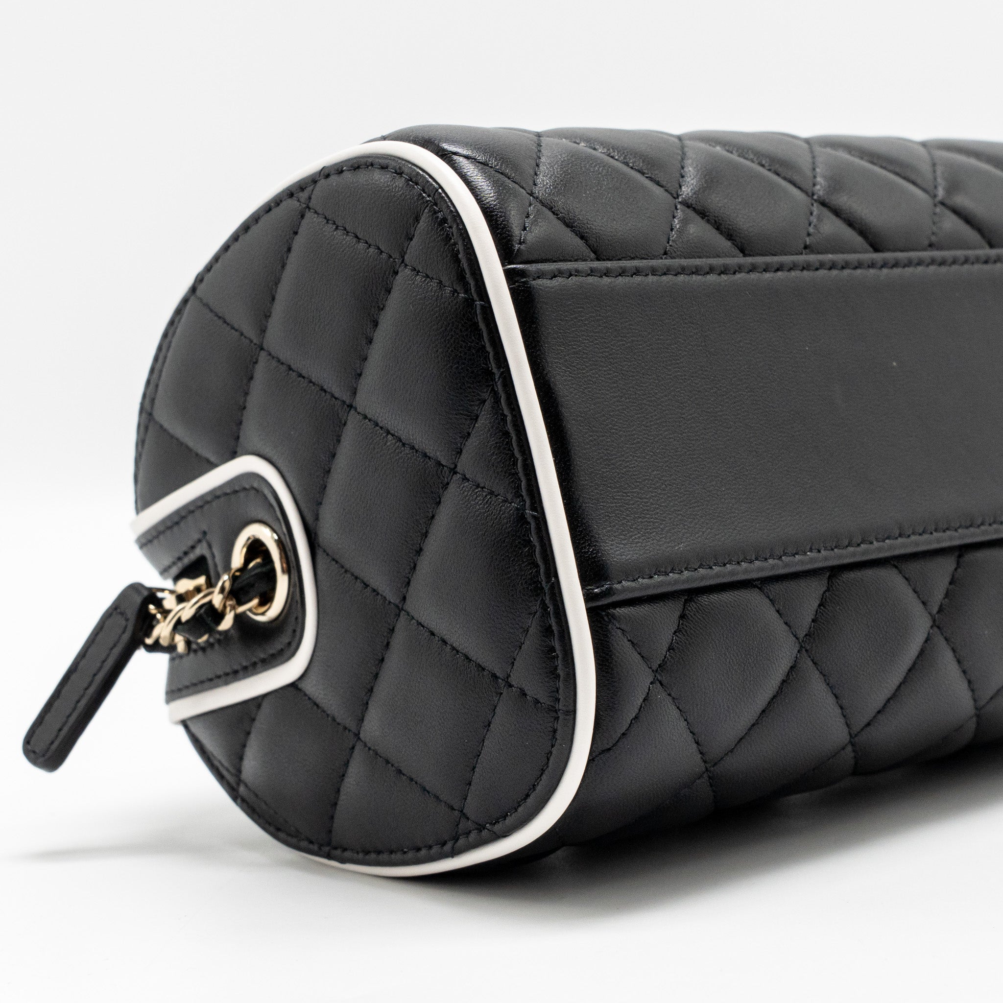 chanel-quilted-bowling-bag-lambskin-black-lghw-microchip