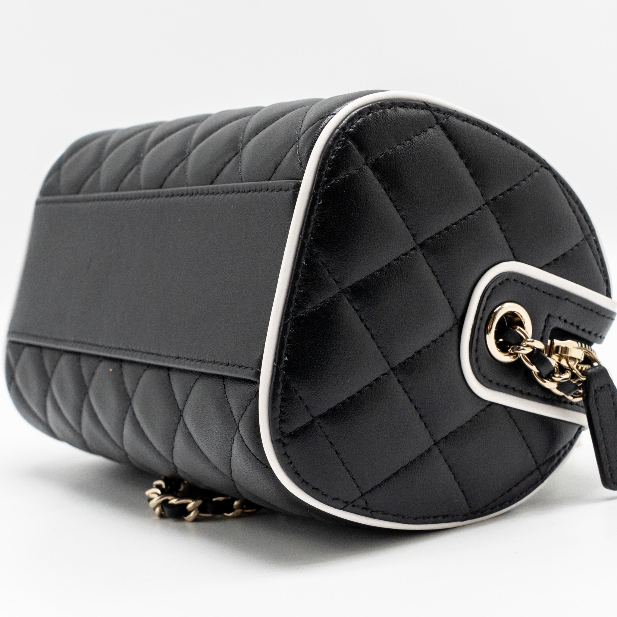 chanel-quilted-bowling-bag-lambskin-black-lghw-microchip