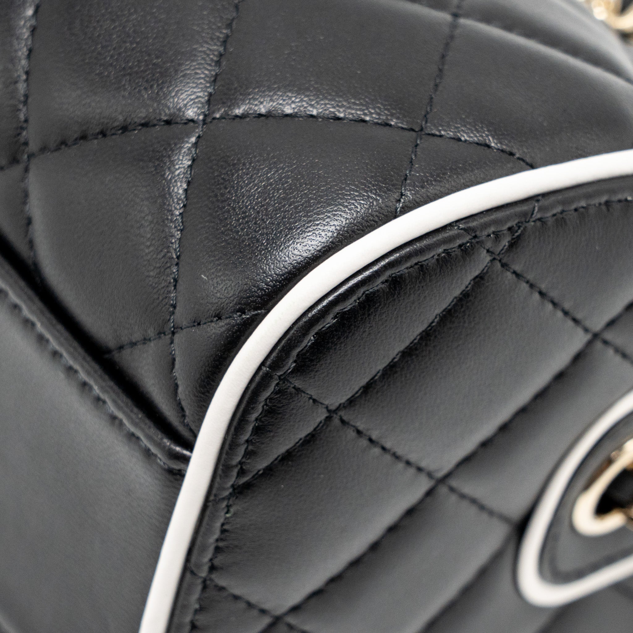 chanel-quilted-bowling-bag-lambskin-black-lghw-microchip