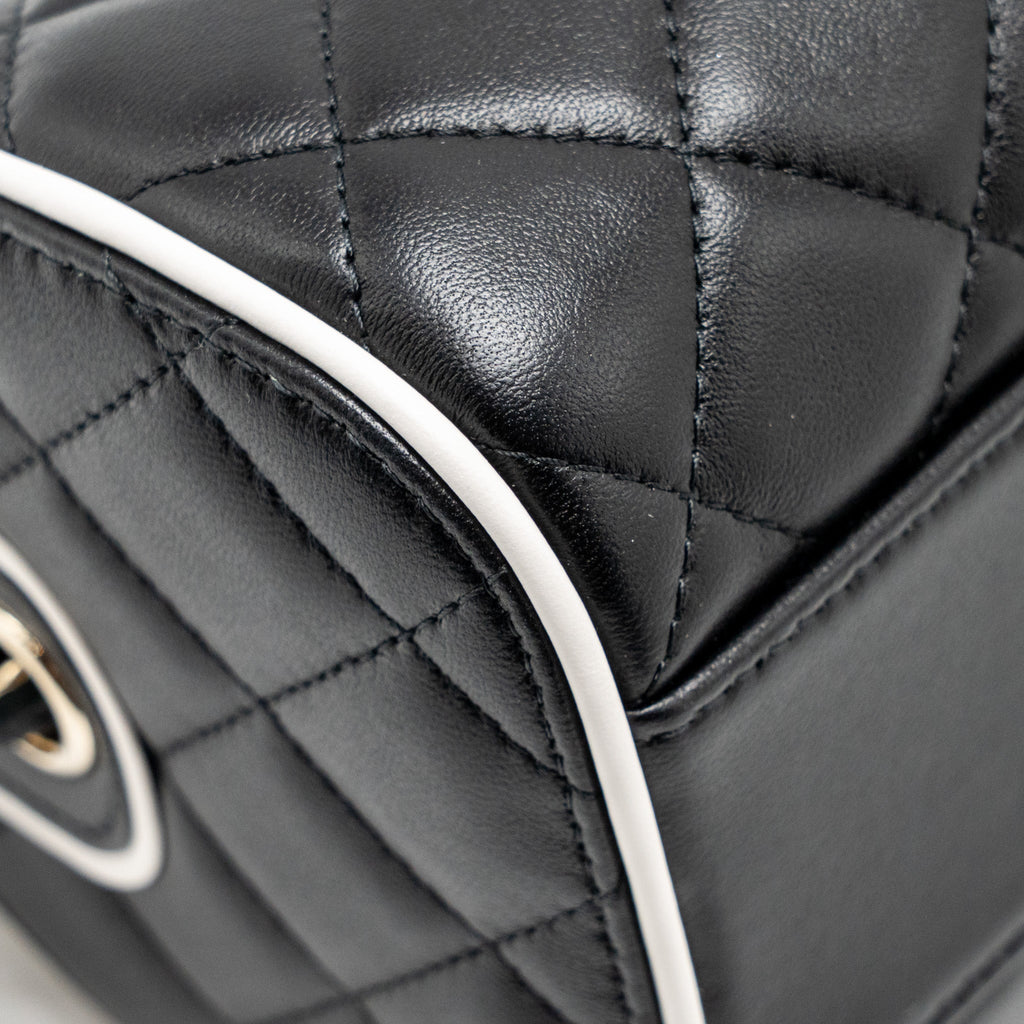 chanel-quilted-bowling-bag-lambskin-black-lghw-microchip