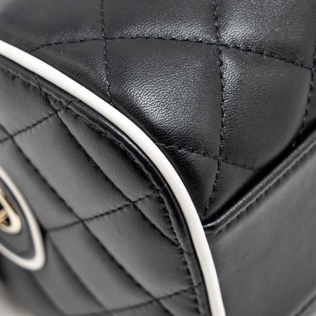 chanel-quilted-bowling-bag-lambskin-black-lghw-microchip