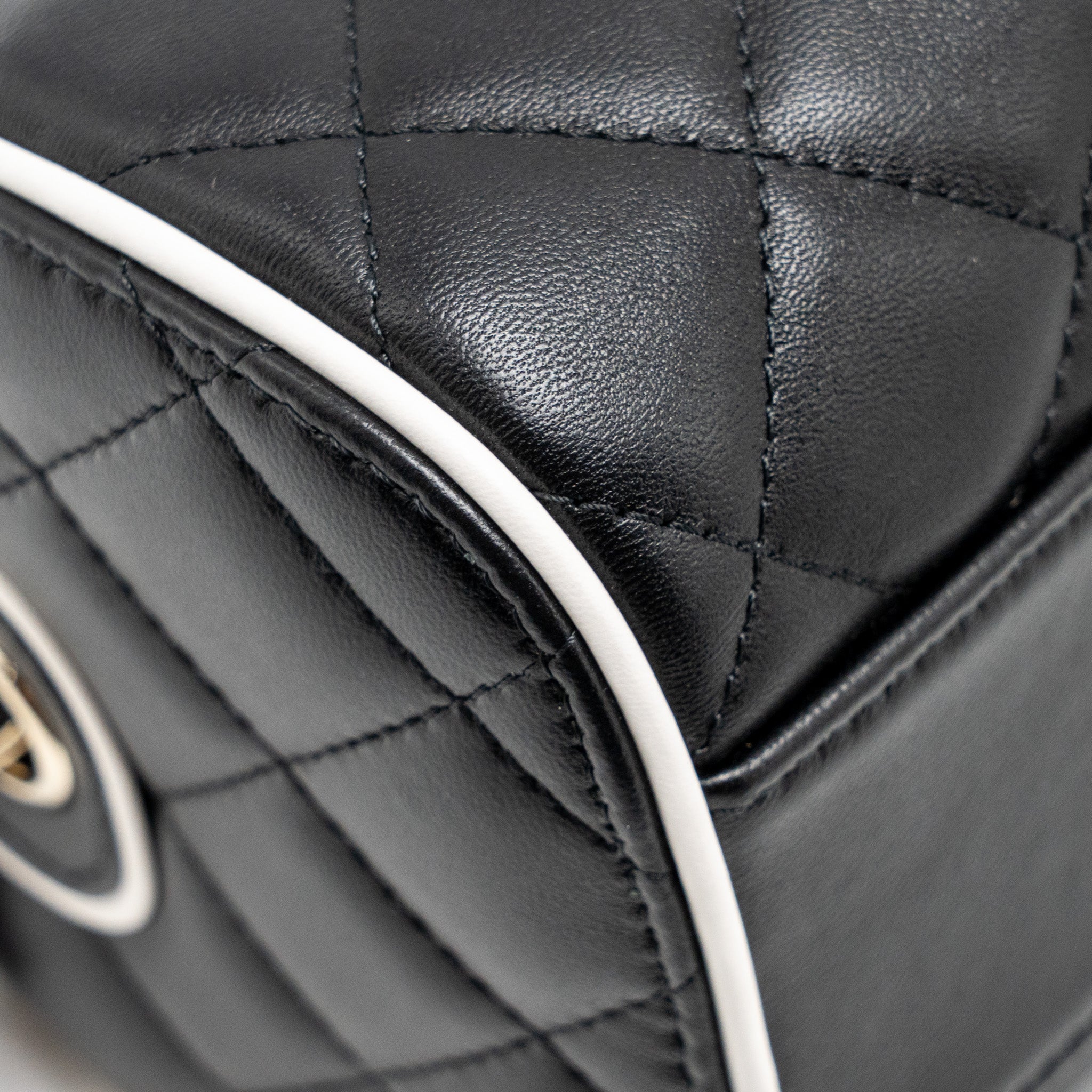 chanel-quilted-bowling-bag-lambskin-black-lghw-microchip