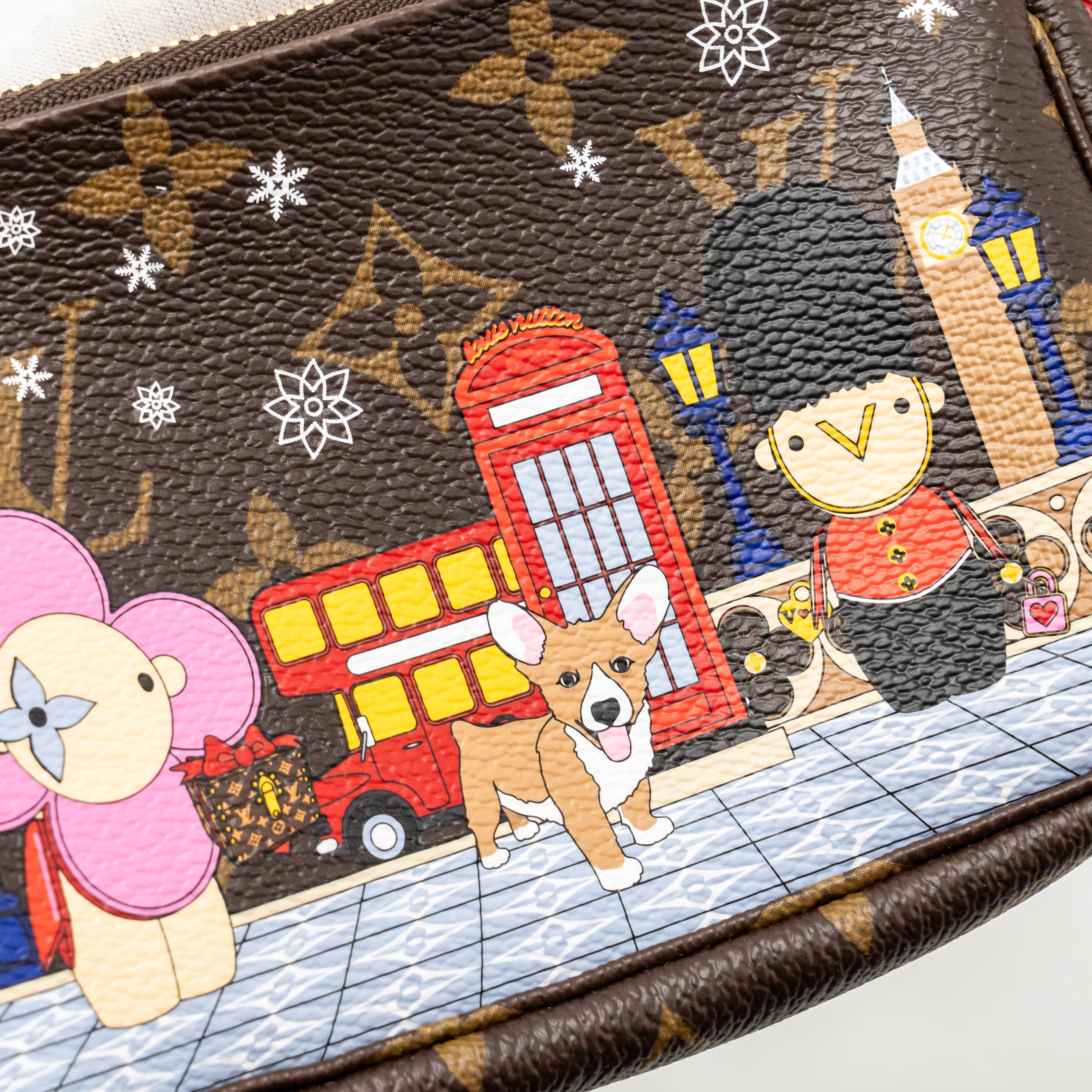 louis-vuitton-mini-pochette-accessories-vivienne-holiday-limited-monogram-canvas-ghw