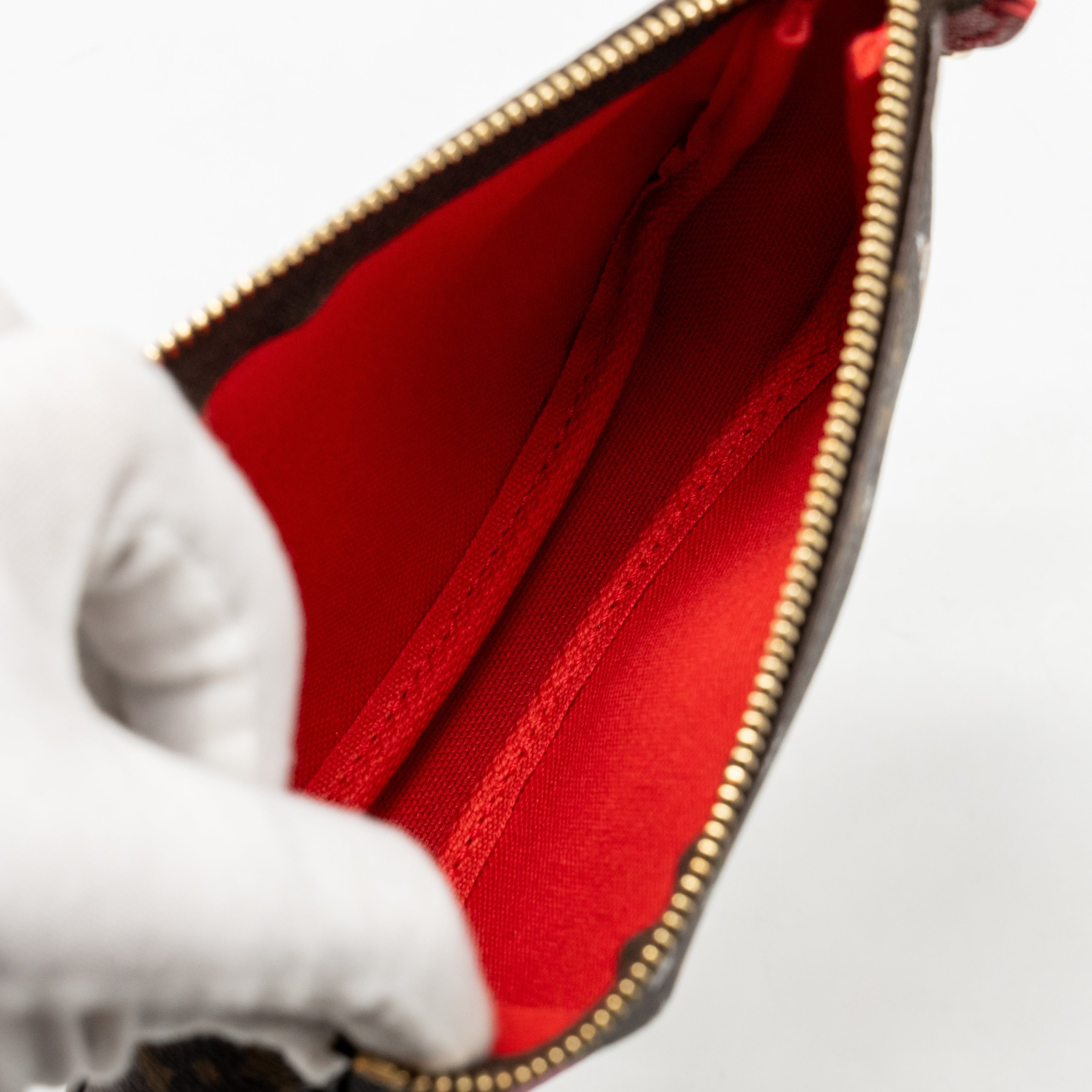 louis-vuitton-mini-pochette-accessories-vivienne-holiday-limited-monogram-canvas-ghw