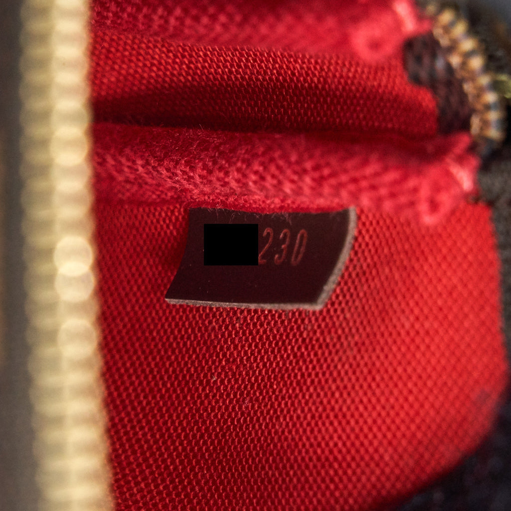 louis-vuitton-mini-pochette-accessories-damier-ebene-canvas