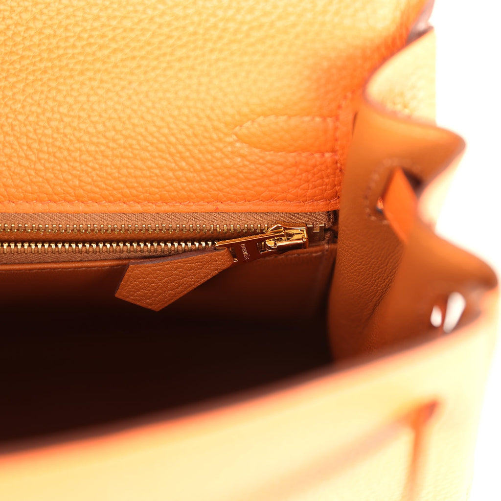 Kelly Retourne 25 Orange Verso Togo Gold Hardware Bag