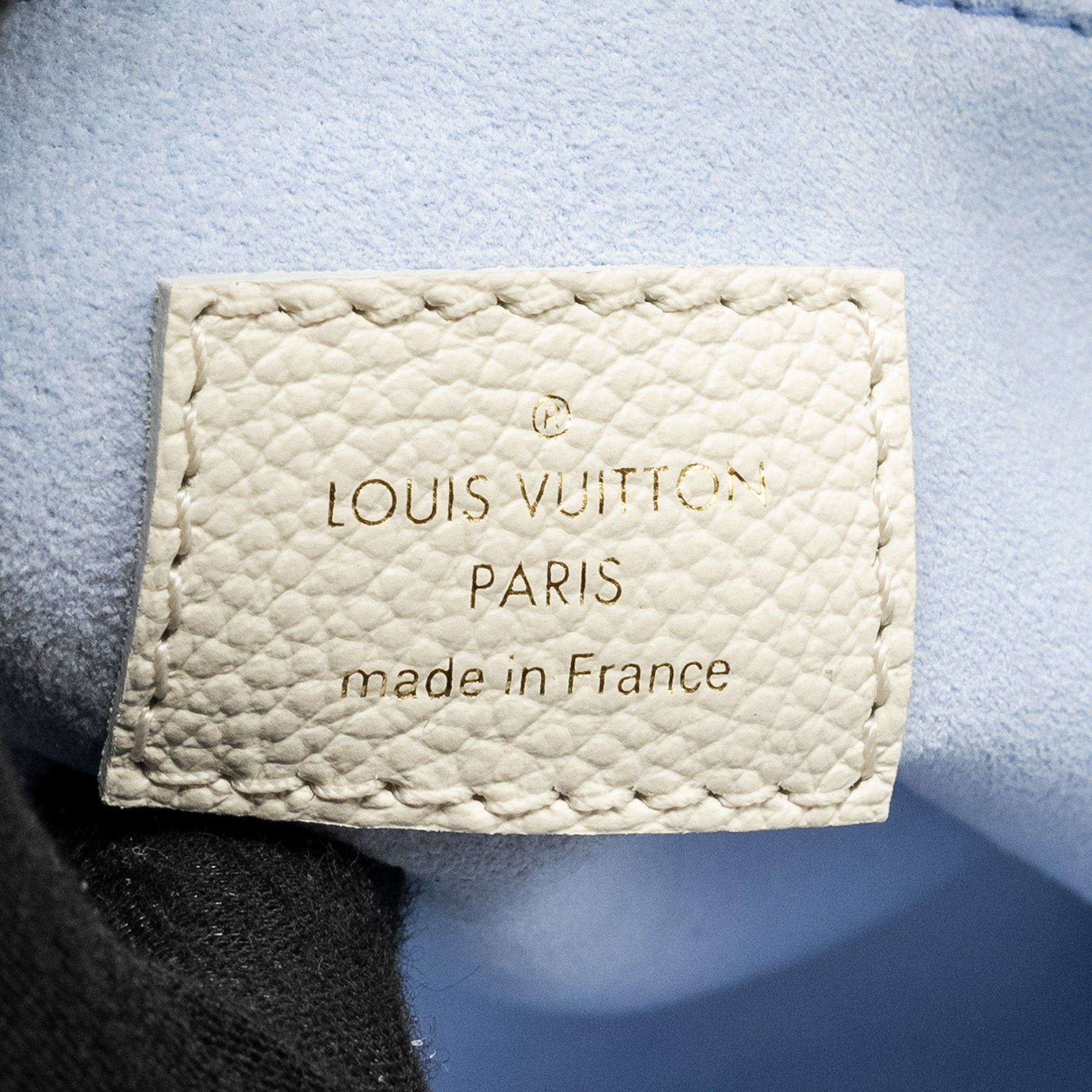 louis-vuitton-onthego-pm-bicolour-monogram-empreinte-latte-candy-blue