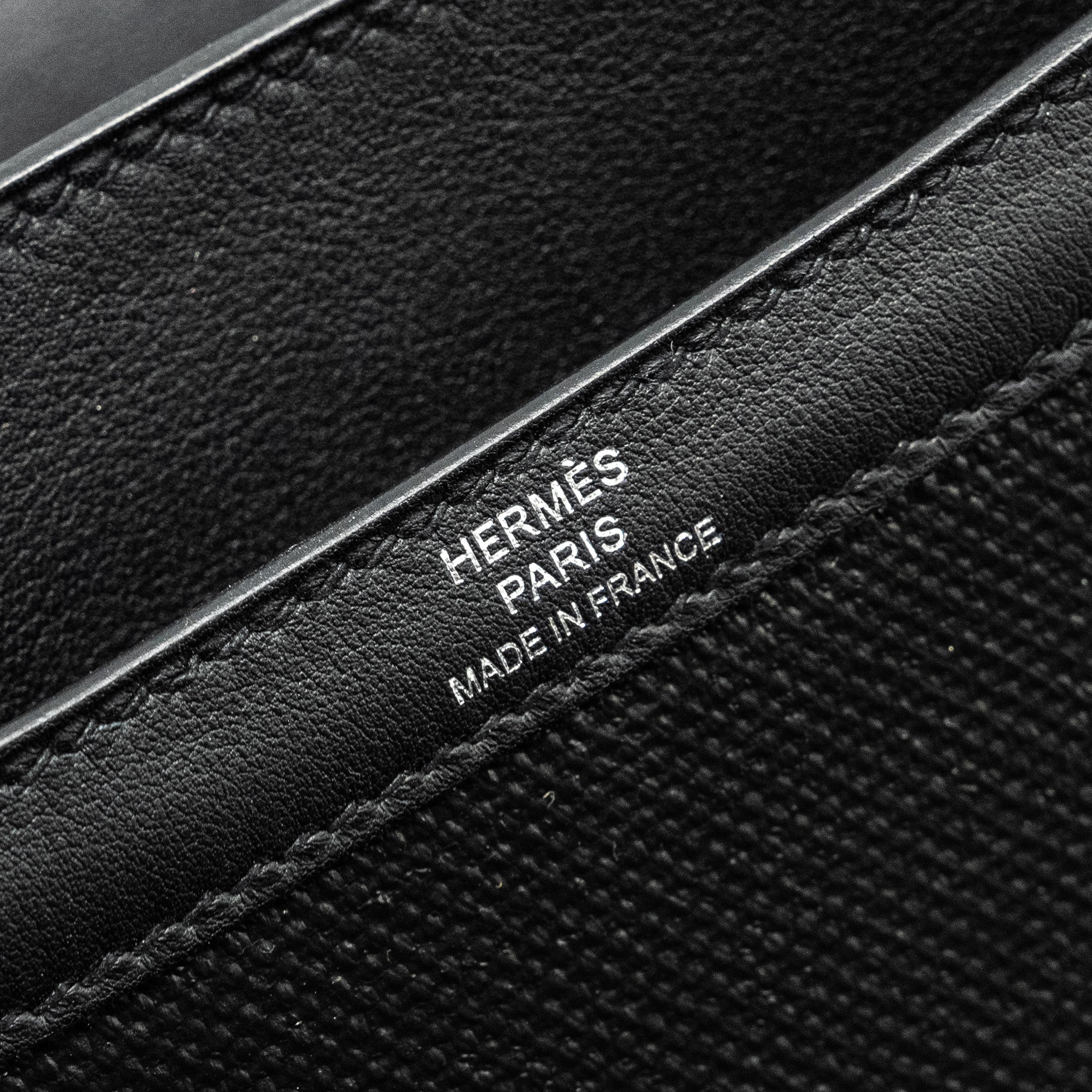 hermes-constance-24-toile-h-berline-plume-swift-black-shw-stamp-y