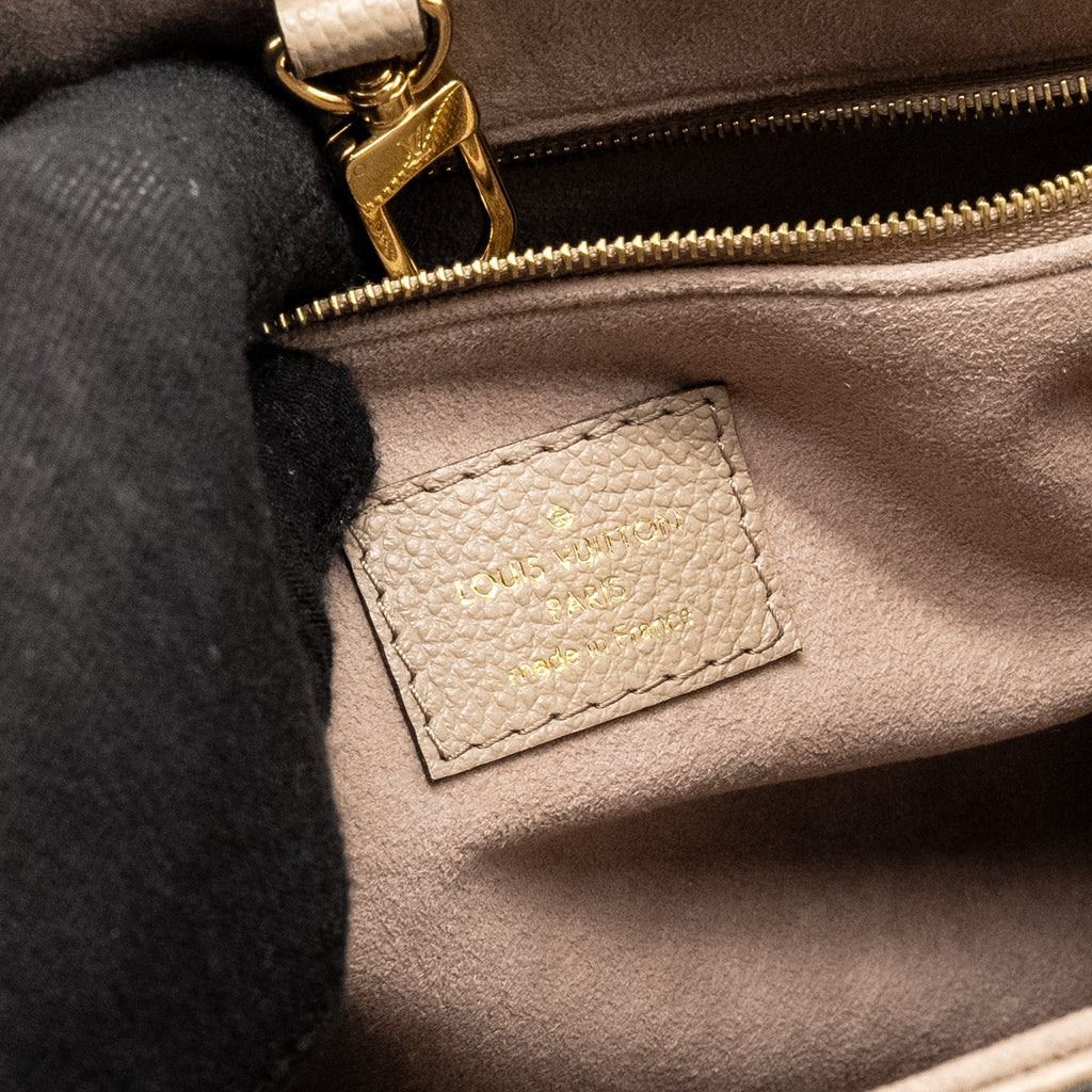 louis-vuitton-on-the-go-pm-bicolour-monogram-empreinte-leather-tourterelle-creme-ghw
