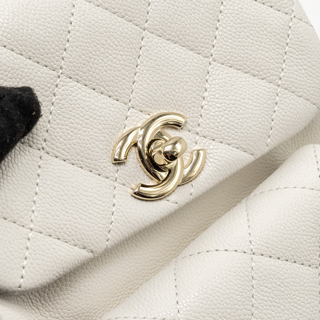 chanel-23k-triple-pocket-mini-backpack-caviar-white-lghw-microchip-copy