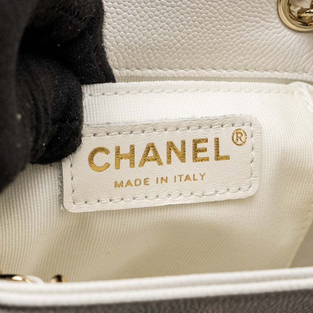 chanel-23k-triple-pocket-mini-backpack-caviar-white-lghw-microchip-copy