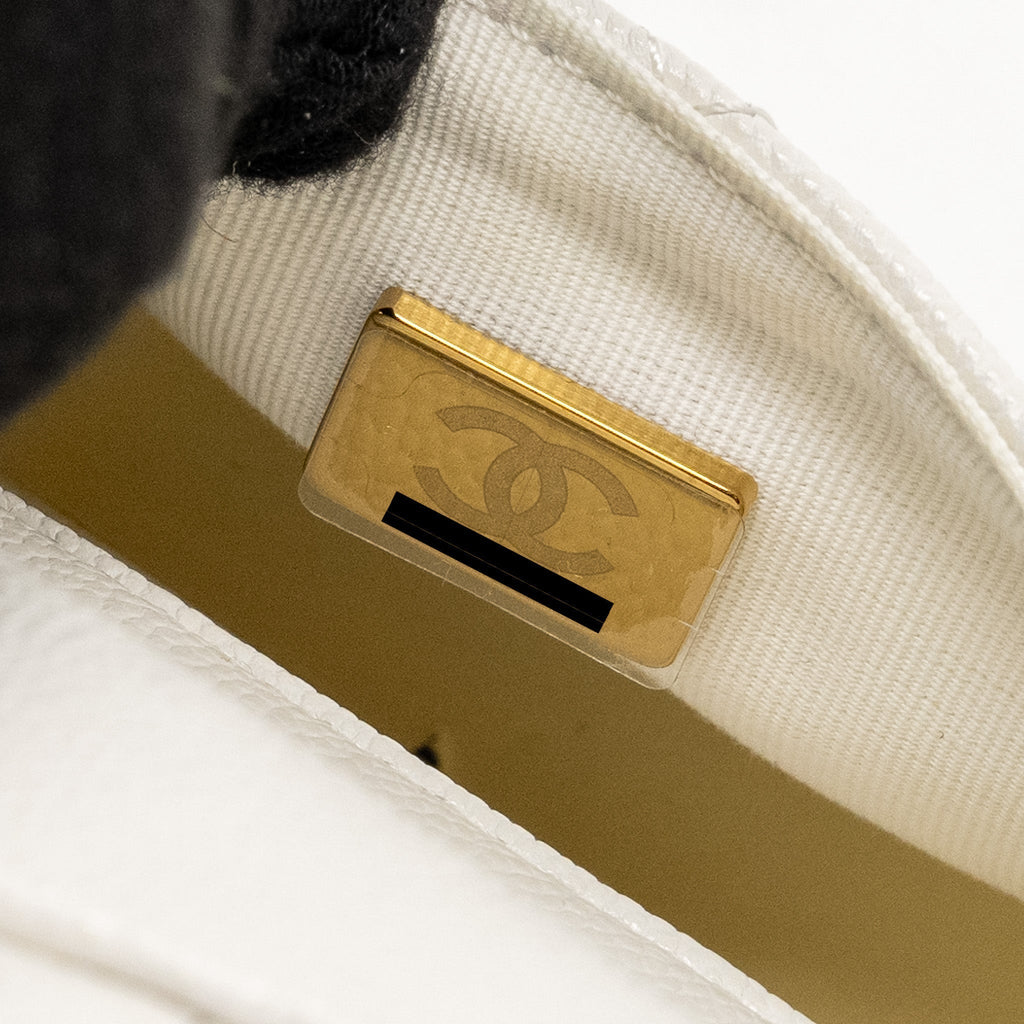chanel-23k-triple-pocket-mini-backpack-caviar-white-lghw-microchip-copy